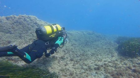 A Civil Guard is pictured diving in Granada, Spain.  (Guardia Civil)