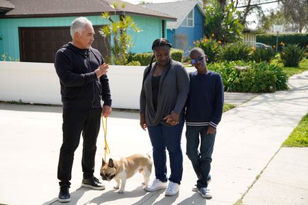 Cesar Millan talking to Ramona and Roman. (National Geographic)