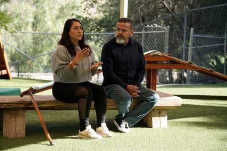 Victoria and Adrian talking to Cesar Millan. (National Geographic)