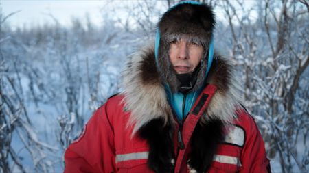 Ricko DeWilde checks his wolf snares. (BBC Studios/Ryan Walsh)