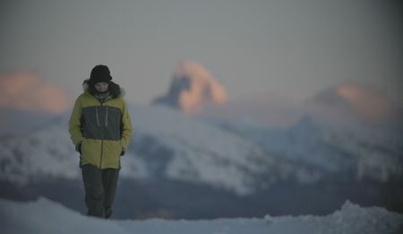 Sarah McNair-Landry walking outside at sundown.  (National Geographic/Ross McDonnell)