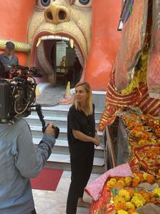 Mariana van Zeller stands inside the Shree Hanuman Temple in New Delhi. (National Geographic for Disney)