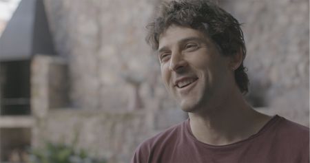 Gerd Serrasolses laughs during his interview in Sort, Spain.  (National Geographic/Gene Gallerano)