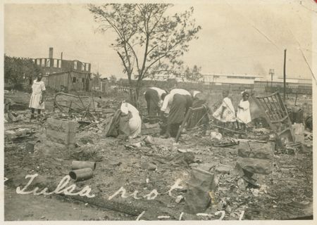 People searching through rubble after the Tulsa Race Massacre in 1921. (Oklahoma Historical Society)