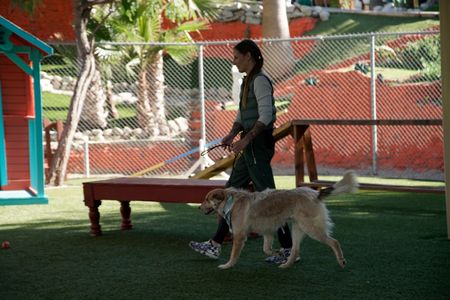 Angela walking with Maverick. (National Geographic)