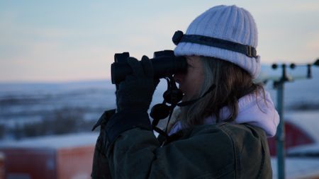 Sue Aikens looking for predators lurking near her camp. (BBC Studios/Michael Cheeseman)