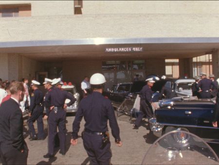 Police gather outside Parkland Hospital in the aftermath of President John F. Kennedy's assassination in Dallas, Nov. 22, 1963. (John F. Kennedy Presidential Library and Museum, Boston)