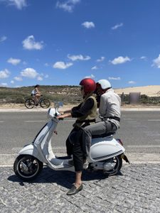 Mariana van Zeller rides a moped with camera crew through the streets of Portugal. (National Geographic for Disney)