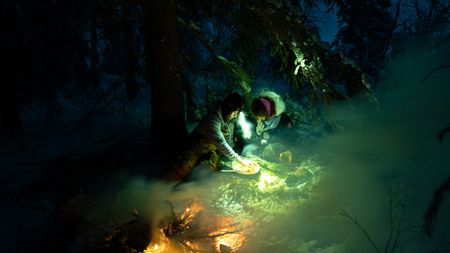 Ricko DeWilde and his daughter, Skarlett enjoy a meal together in the wilderness. (BBC Studios Reality Productions, LLC/Jensen Walker)