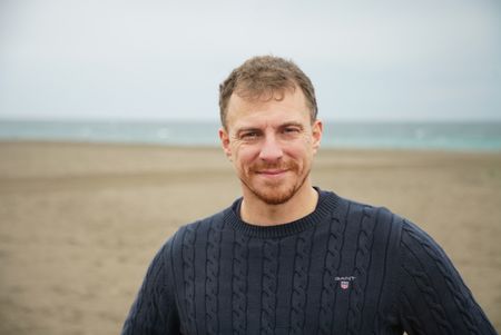 Arthur Williams is pictured on a beach in Britain for the Hythe story (National Geographic/Jahlani Clarence)