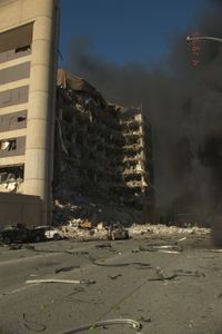 The damaged front of the Alfred P. Murrah Federal Building is pictured, as cars parked outside continue to burn following the bombing on April 19th, 1995, in Oklahoma City, Okla. (Danny Atchley)