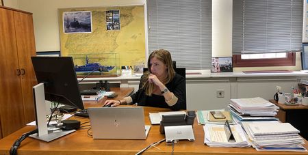 Laura Rebollo (Head of the Tax Agency Aeronaval Operations and CECOP Areas) works at her office. (National Geographic/Belén Ruiz)