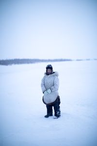 Agnes Hailstone ice fishing with her daughters and grandson on their families property during the winter season. (BBC Studios Reality Productions, LLC/Pedro Delbrey)