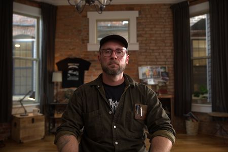 Journalist Dylan Taylor-Lehman is pictured in a portrait made during the production of "Cursed Gold: A Shipwreck Scandal." In 1989, maverick scientist Tommy Thompson stuns the world by recovering three tons of gold from a shipwreck deep in the Atlantic Ocean. What follows is a 30-year story of adventure, deception, and personal turmoil, taking him from venerated celebrity to infamous fugitive, and finally a defiant prisoner who refuses to give up his gold. (National Geographic)