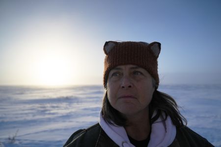 Sue Aikens hunts for ptarmigan in the tundra during the winter season for subsistence food. (BBC Studios Reality Productions, LLC/Jayce Kolinski)