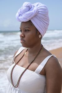 Delisha Marshall stands reverently on Ouidah Beach, where her ancestor, Peter 'Gumpa' Lee, was taken in 1860. (National Geographic/Etinosa Yvonne)