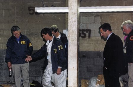 Special Agent in Charge Bob Ricks and FBI Director Louis Freeh examine evidence inside the Alfred P. Murrah Federal Building April 19, 1995, in Oklahoma City, Okla. (FBI)