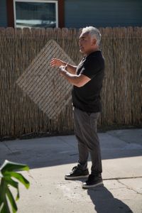 Cesar Millan talking to a client. (National Geographic)