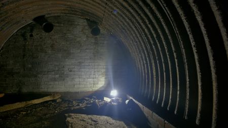 A newly discovered secret WW2 bunker is explored. (National Geographic)