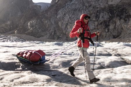 Alex Honnold traverses a stretch of dry glacier in Eastern Greenland.  (photo credit: National Geographic/Pablo Durana)