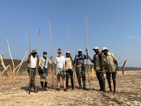 The film crew with Flamingo Scientist Timothy Mwinami and his assistants in Lake Bogoria, Kenya. (National Geographic for Disney/Bernard Mwuara)