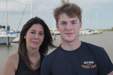 Trent Trencosta and mom Shelli Trentcosta in front of Lake Pontchartrain. (National Geographic/Martin Cass)