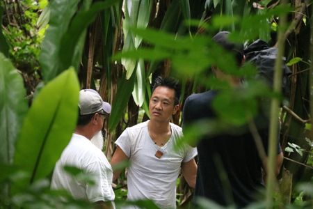 Dr. Albert Lin talks with Rohsa Willy Hawley at an ancient site on Ant Atoll, Micronesia. (National Geographic/Blakeway Productions)