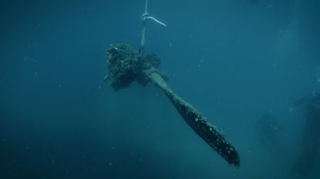The propeller and gear box of Frank Moody's missing P39 Airacobra are being lifted onto the Dive-Version boat for conservation and restoration. (National Geographic)