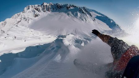 Point of view of Travis Rice as he snowboards on a mountain in Alaska.  (photo credit: Travis Rice, Inc)