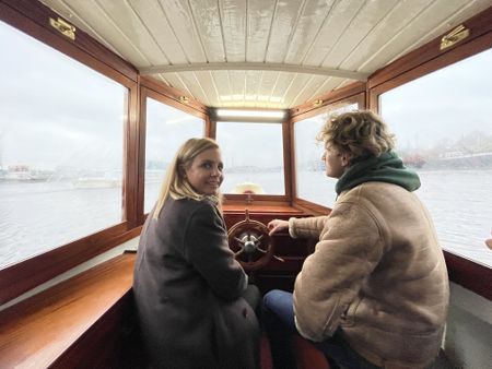 Mariana van Zeller (L) on boat on the Amstel River. (Credit: National Geographic)
