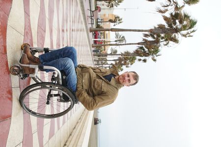 Arthur Williams talks about the Spanish Civil War, at Almeria beach, in Spain. (National Geographic/Ciaran Henry)