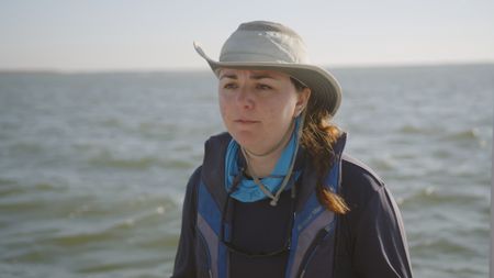 Sara Casareto, expert, describing the bull shark tagging process that the team are carrying out in the Rookery Bay, Florida area. (National Geographic)