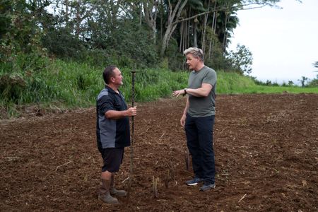 Kawika and Gordon Ramsay talk at the Taro farm. (National Geographic/Justin Mandel)