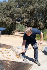 Portugal - Gordon Ramsay makes lunch for pigs on a farm in Portugal. (Credit: National Geographic/Justin Mandel)