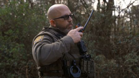 Multiple HSI agents conduct a raid of a suspect's residence during an operation in  Los Angeles. (National Geographic)