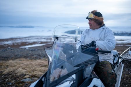 Chip Hailstone prepares  his snowmobile to travel to a nearby location to build a bird blind during the early spring migration. (BBC Studios Reality Productions/Ashton Hurlburt)