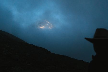 Tibet - Conrad Anker looks toward Mount Shishapangma. (National Geographic/Max Lowe)