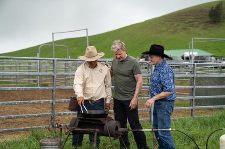 Gordon Ramsay (center) and contributors cook at the beef farm. (National Geographic/Justin Mandel)