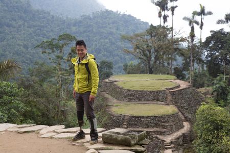 Ciudad Perdida, Colombia - Dr. Albert Lin in front of the central terraces of the ancient city of Ciudad Perdida. (Blakeway Productions/National Geographic)
