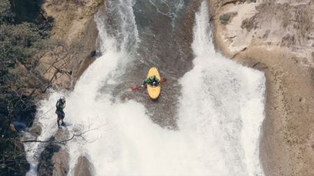 Evan Garcia kayaks down a waterfall on the Santo Domingo river, in Mexico.  (mandatory photo credit: Rush Sturges / River Roots Productions)