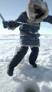 Jaxon Hoffman ice fishing with his family. (BBC Studios Reality Productions, LLC/Brian Bitterfeld)